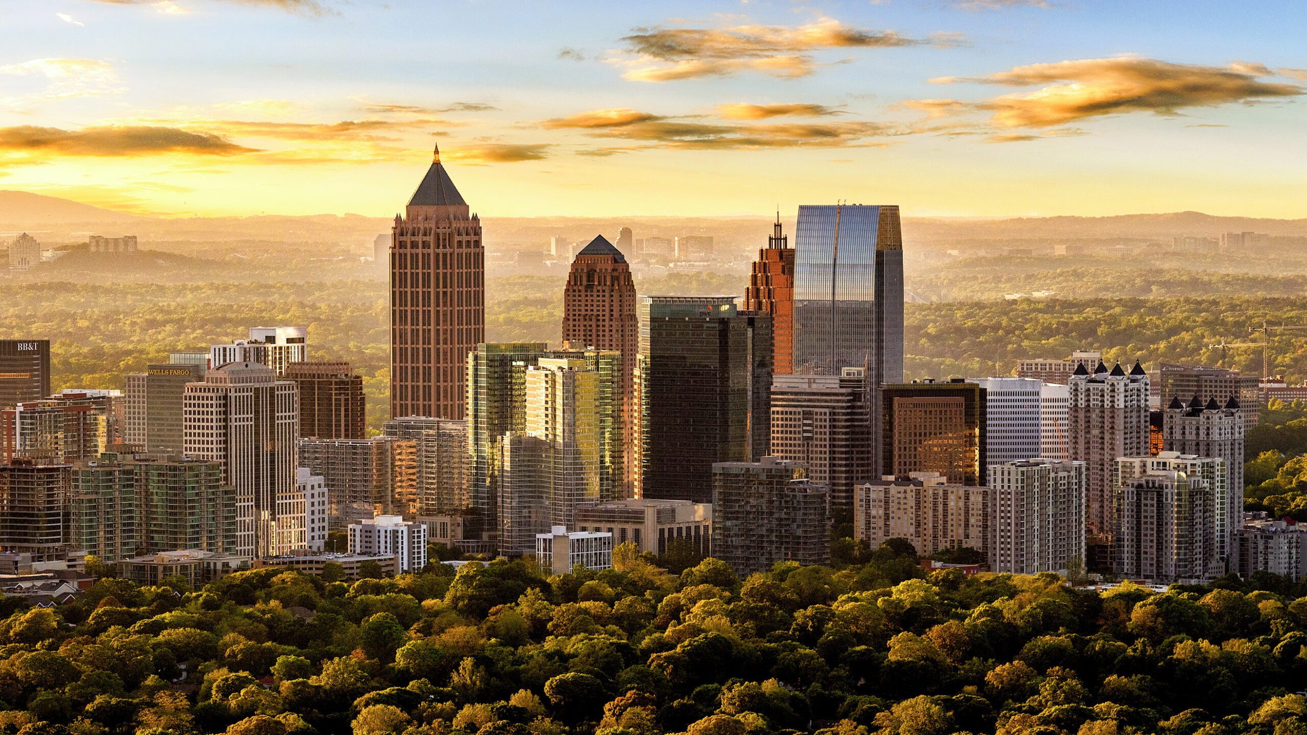City skyline at golden hour representing real estate investment and wealth building